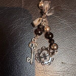 Elegant Silver and Black Key Charm